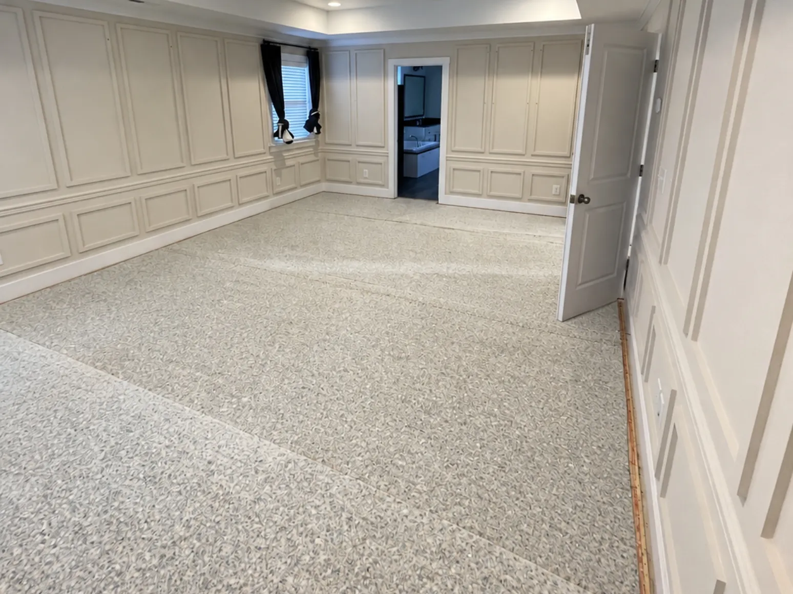 Before hardwood installation: Primary suite, carpet to gray-washed oak