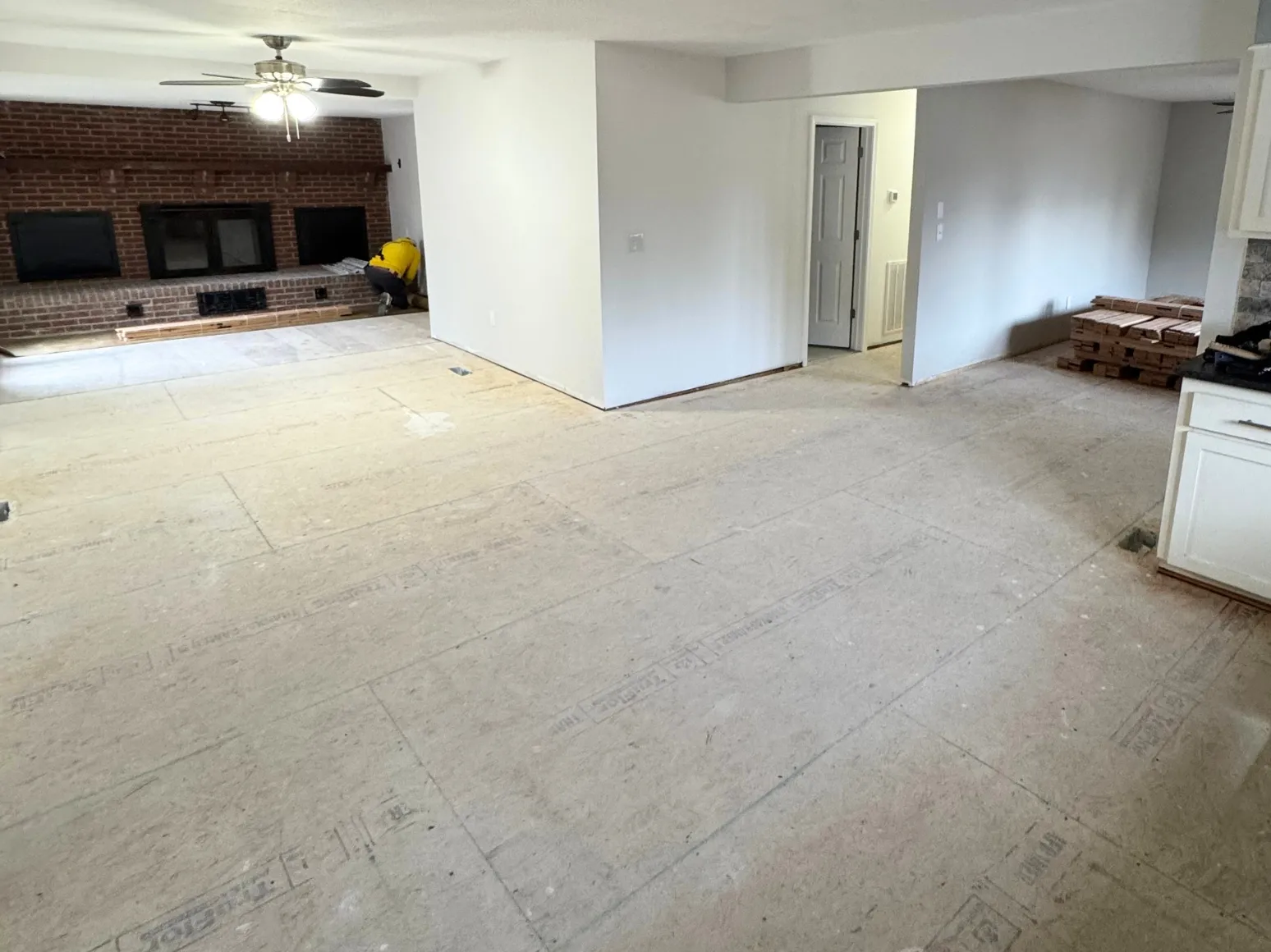 Before hardwood installation: Open lower level, bare subfloor to oak