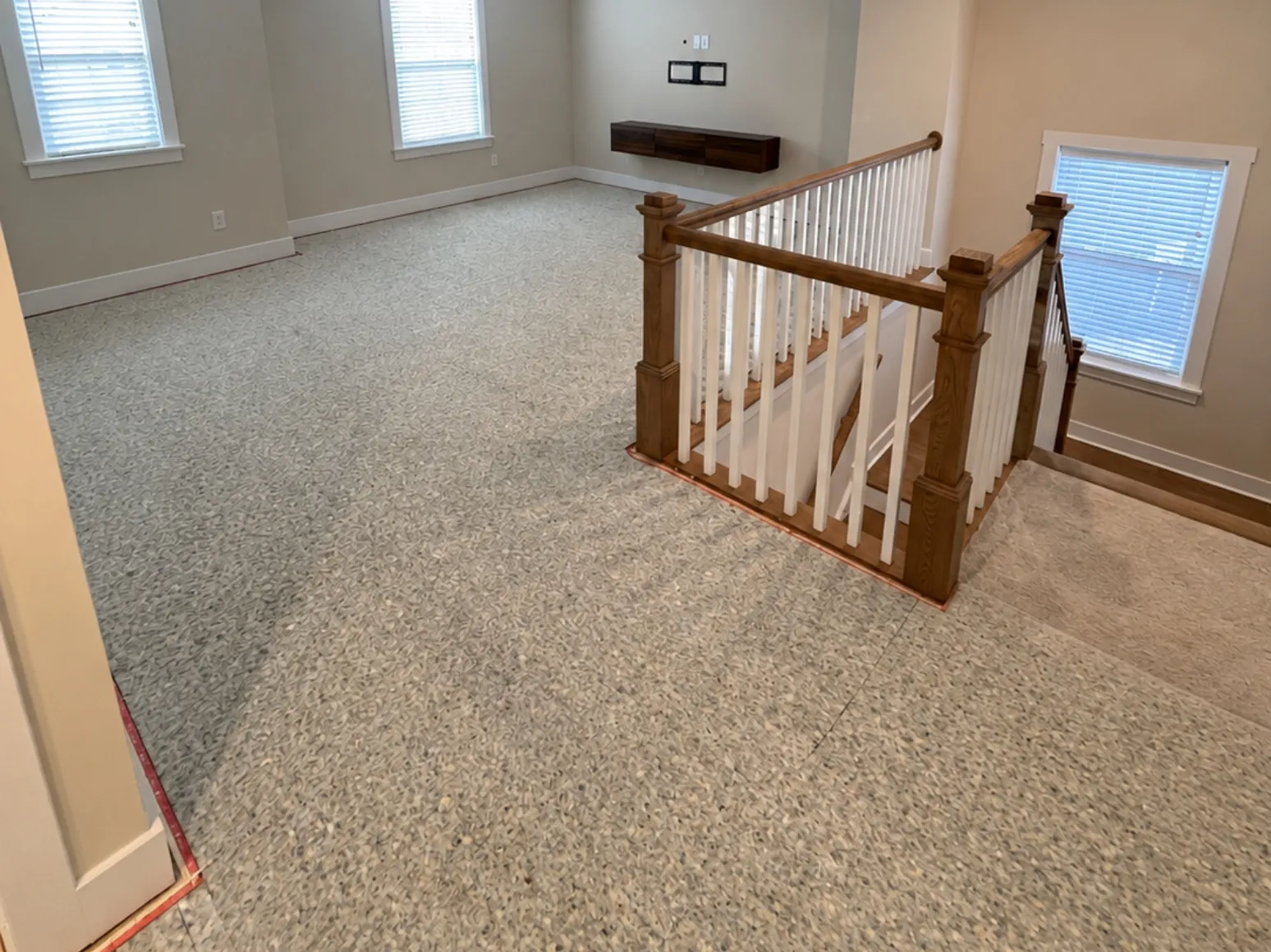 Before hardwood installation: Stair landing, carpet to hardwood