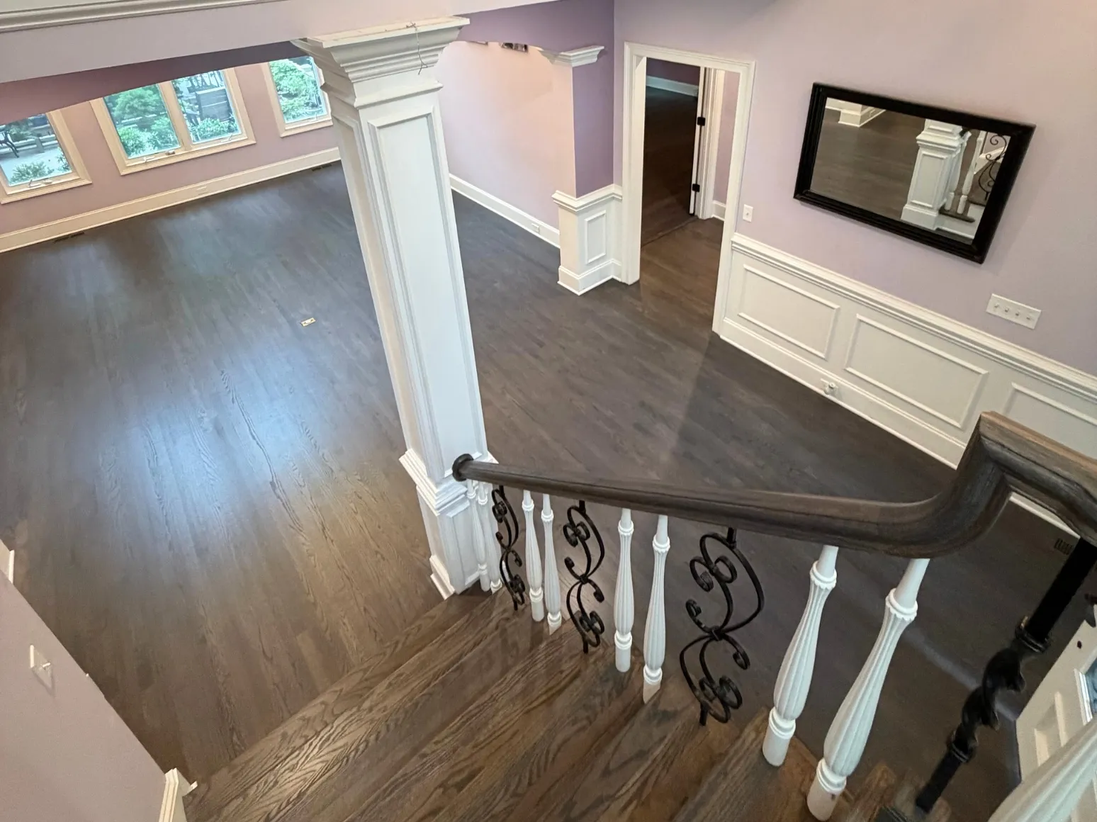 After refinishing: Foyer and staircase, orange oak to charcoal