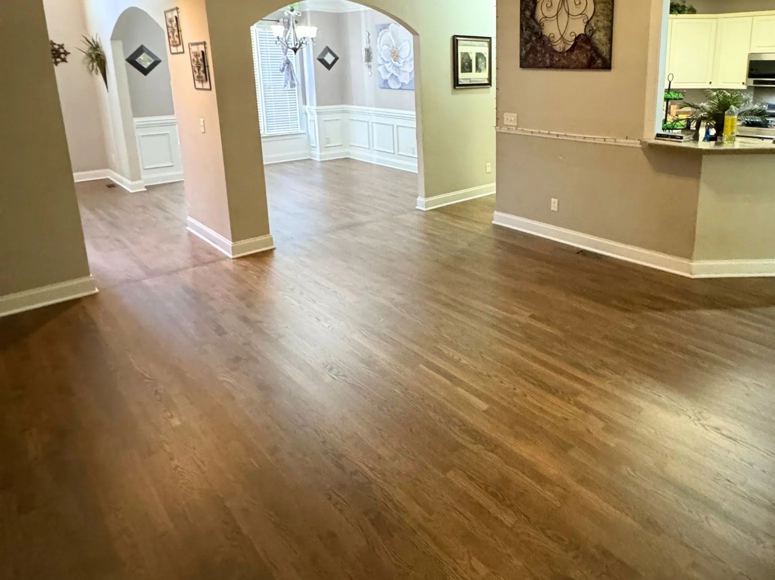 After refinishing: Open hallway, honey oak to rich brown