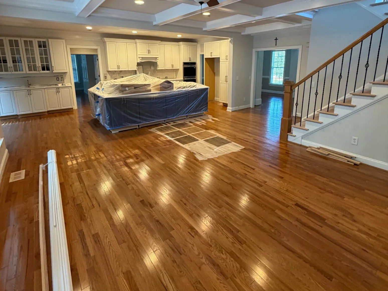 Before refinishing: Kitchen and staircase, deeper brown stain