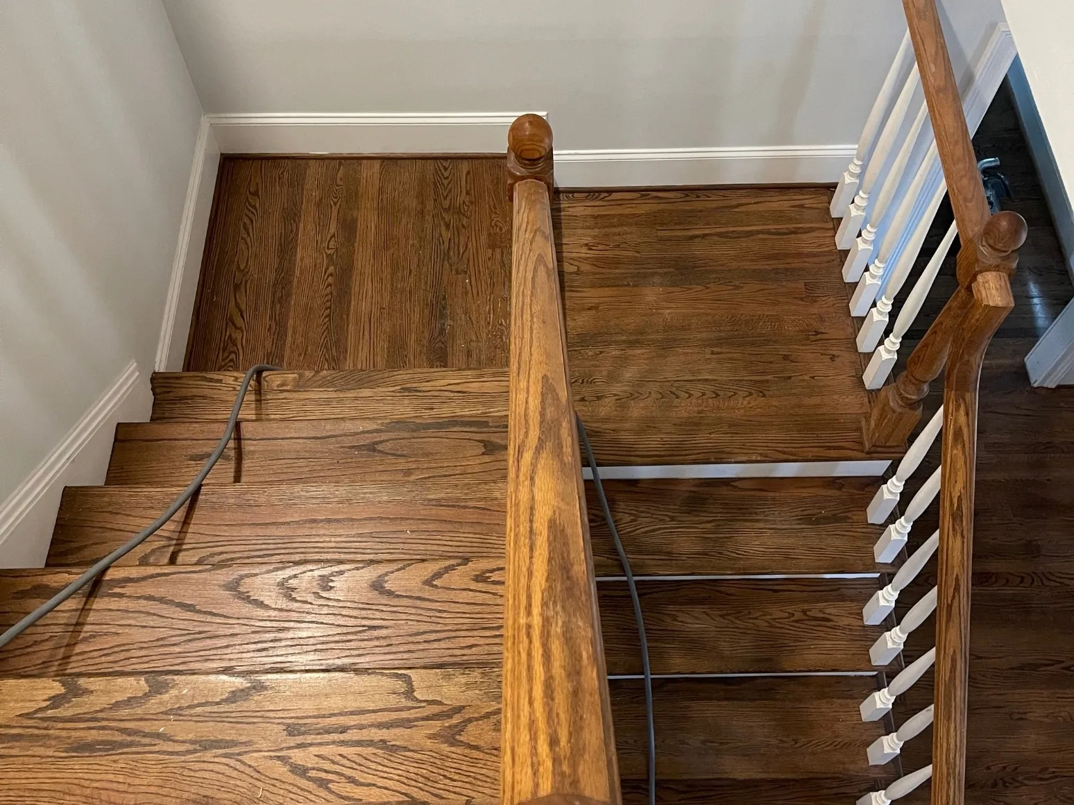 Before staircase refinishing: Landing and staircase, honey oak to rich brown