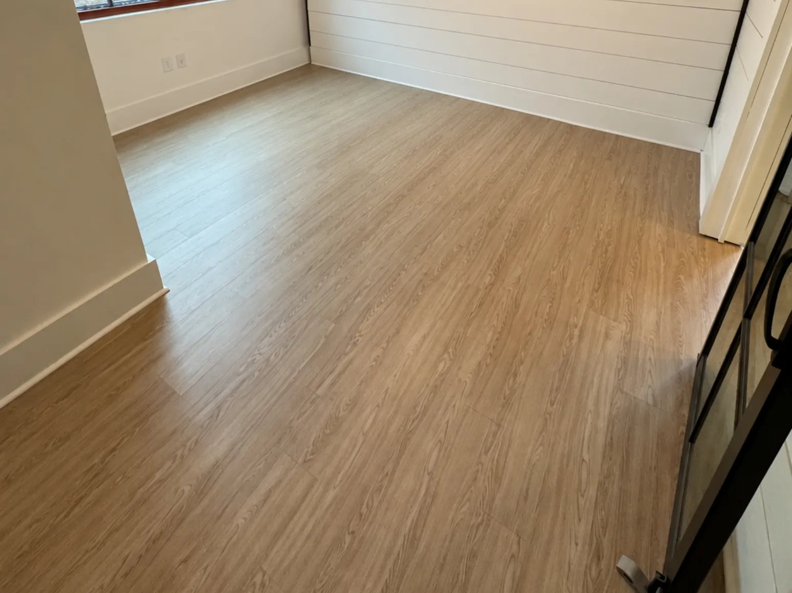 After luxury vinyl plank installation: Mudroom, bare subfloor to light LVP